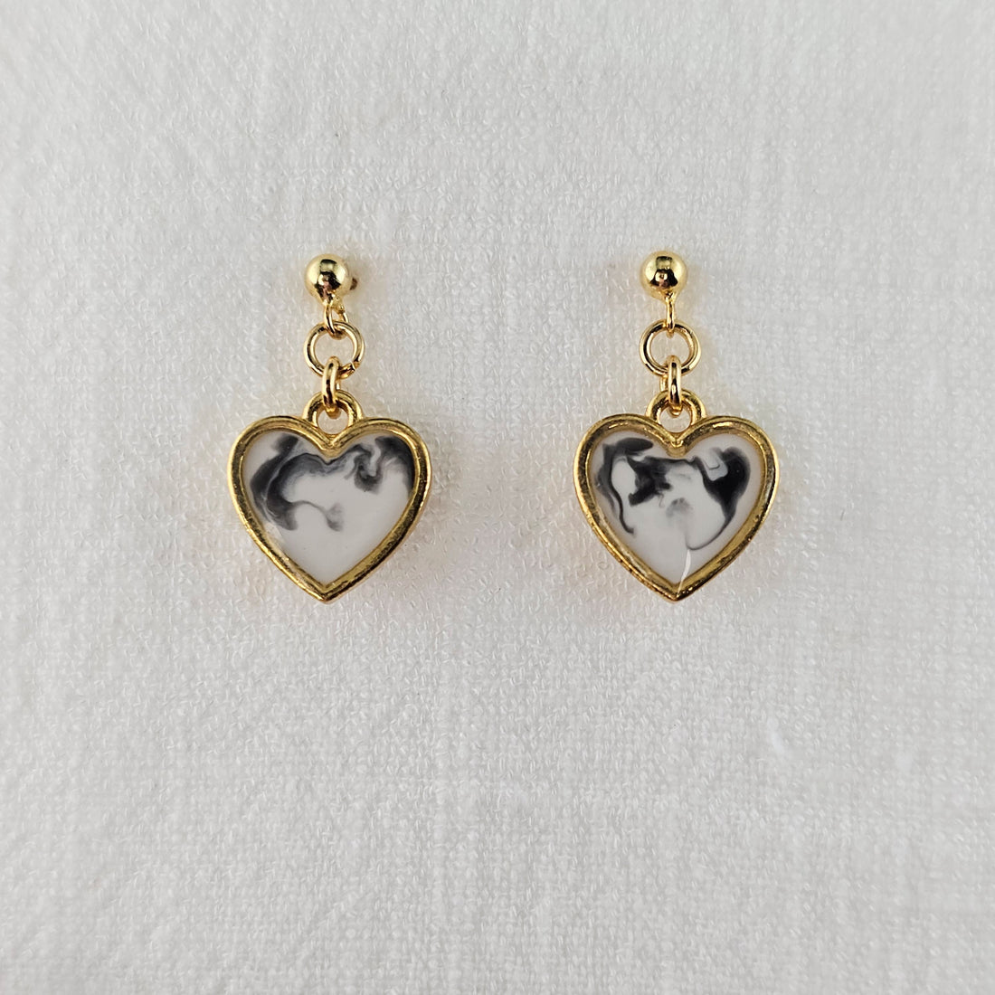 Heart earrings with black and white swirls, with 18k gold plated sterling silver studs