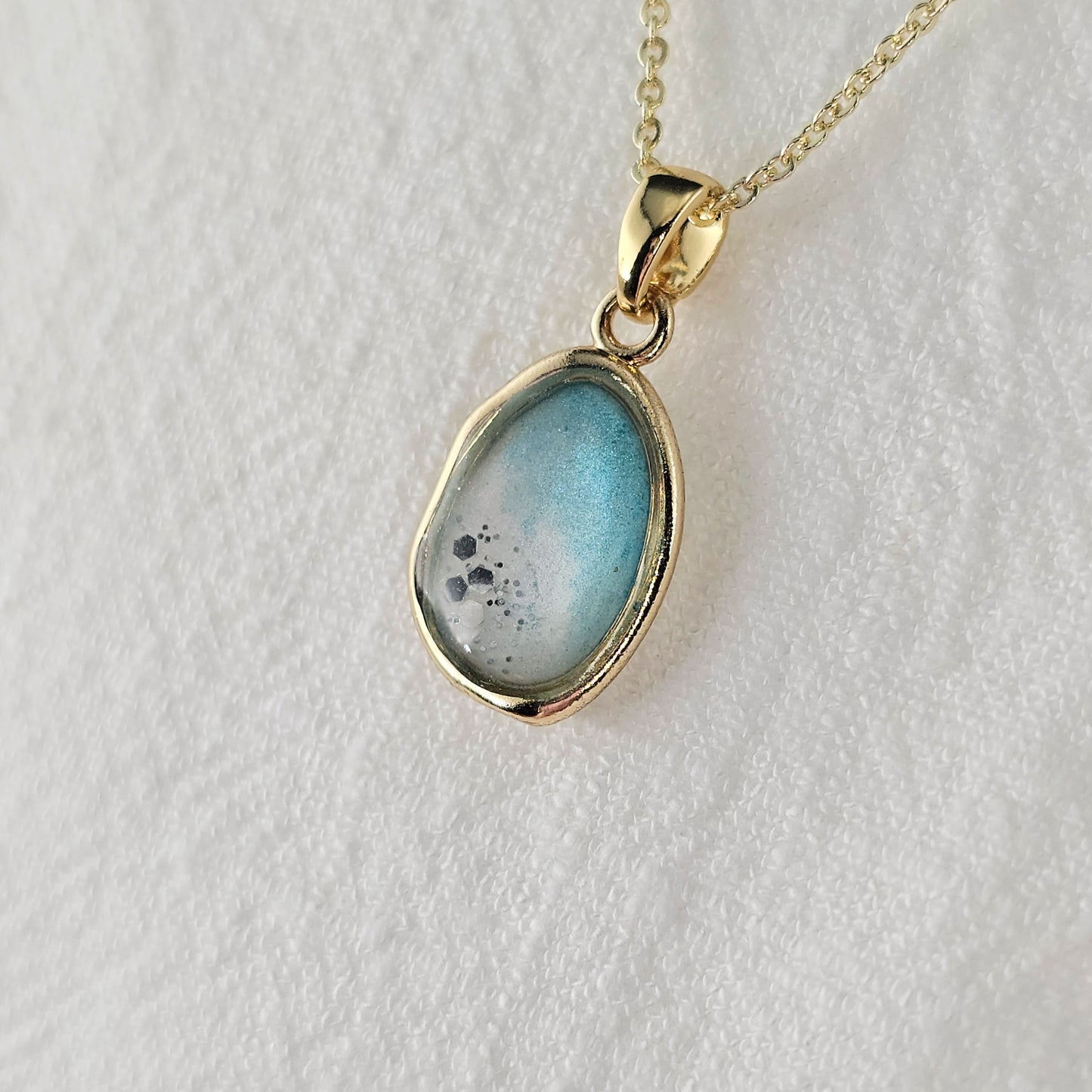 Handmade oval pendant with aquamarine and white shimmer and gold flakes, 14k gold plated chain, gift for her