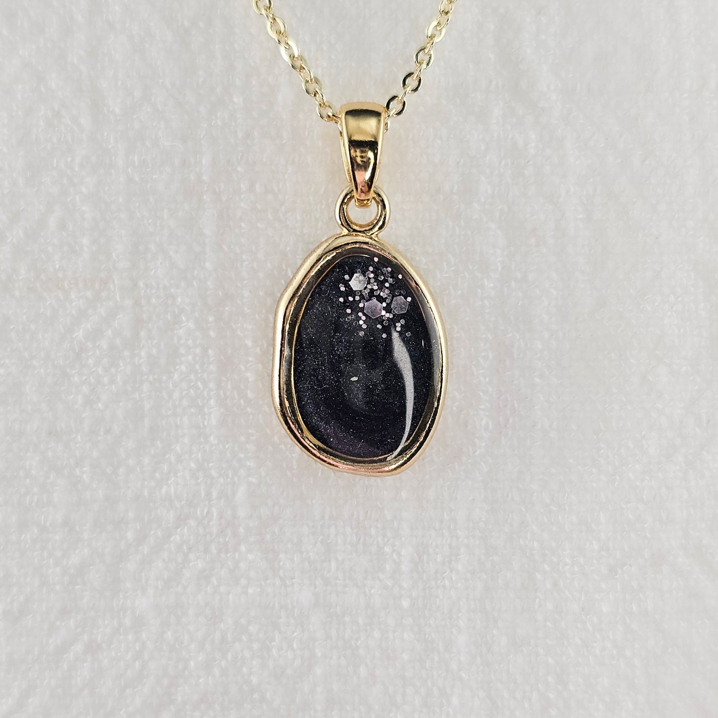Handmade oval pendant with black and grey swirls and silver flakes, 14k gold plated chain, gift for her