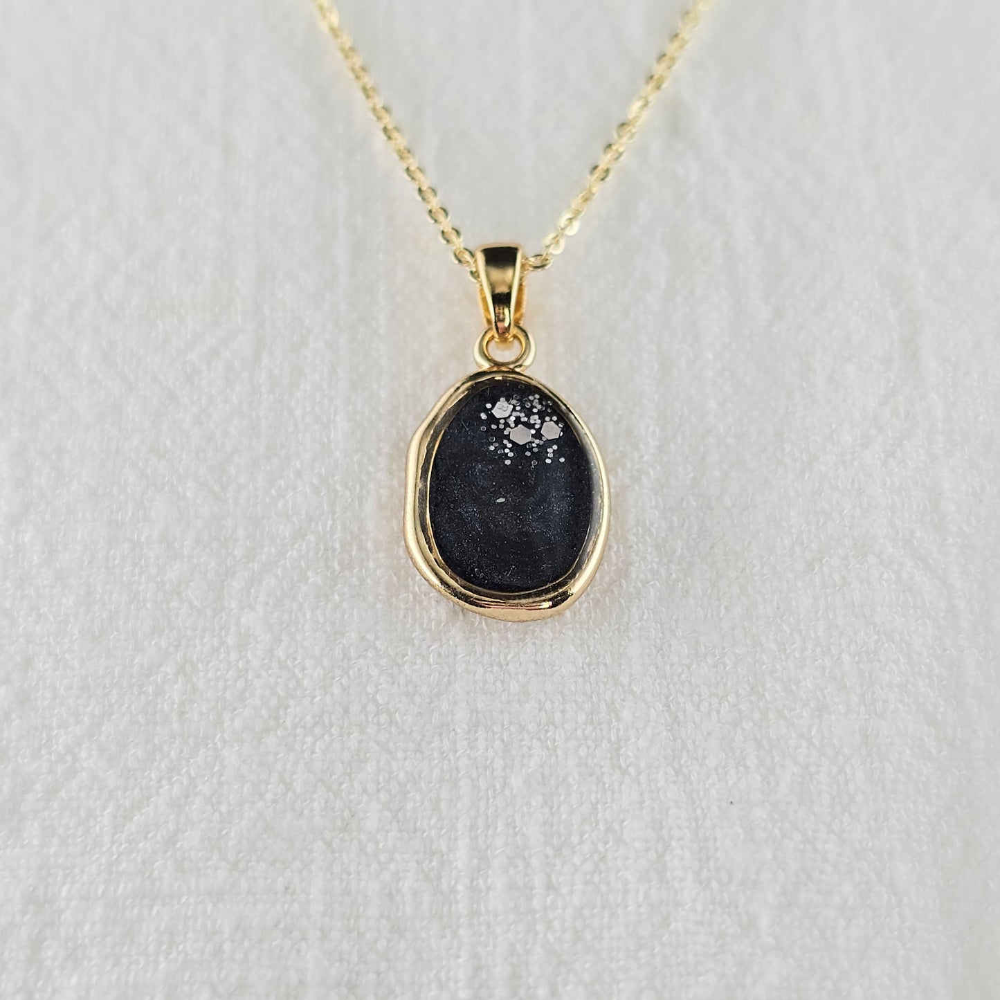 Handmade oval pendant with black and grey swirls and silver flakes, 14k gold plated chain, gift for her
