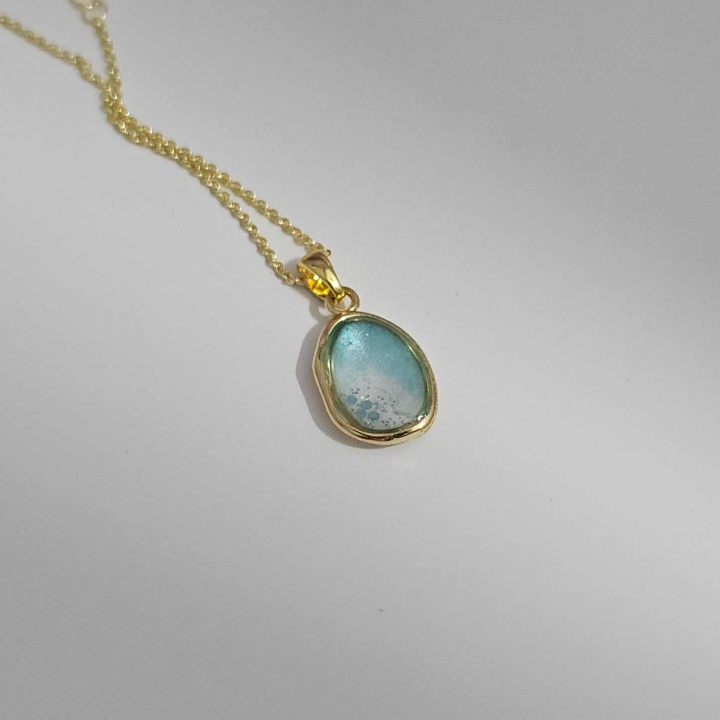 Handmade oval pendant with aquamarine and white shimmer and gold flakes, 14k gold plated chain, gift for her
