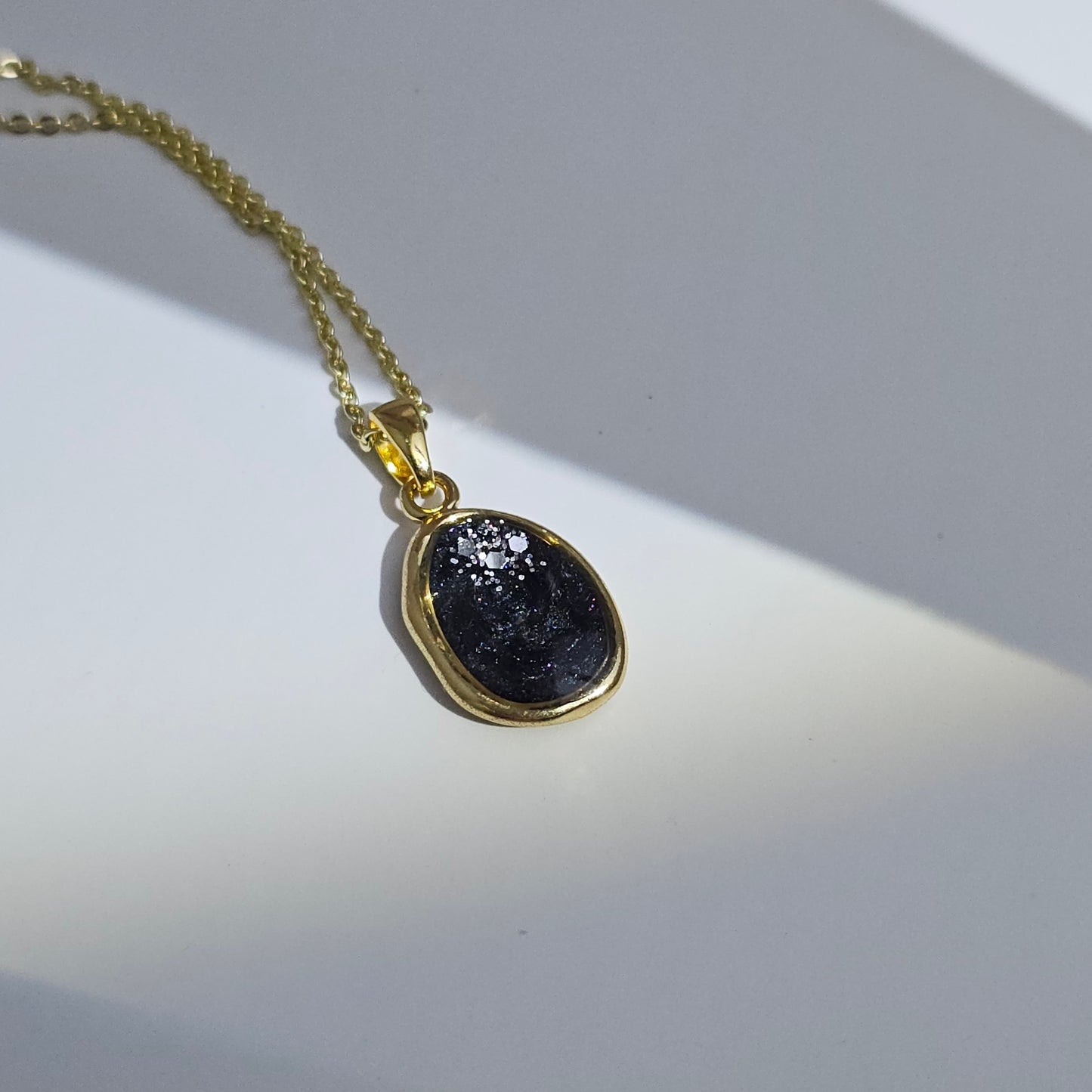 Handmade oval pendant with black and grey swirls and silver flakes, 14k gold plated chain, gift for her