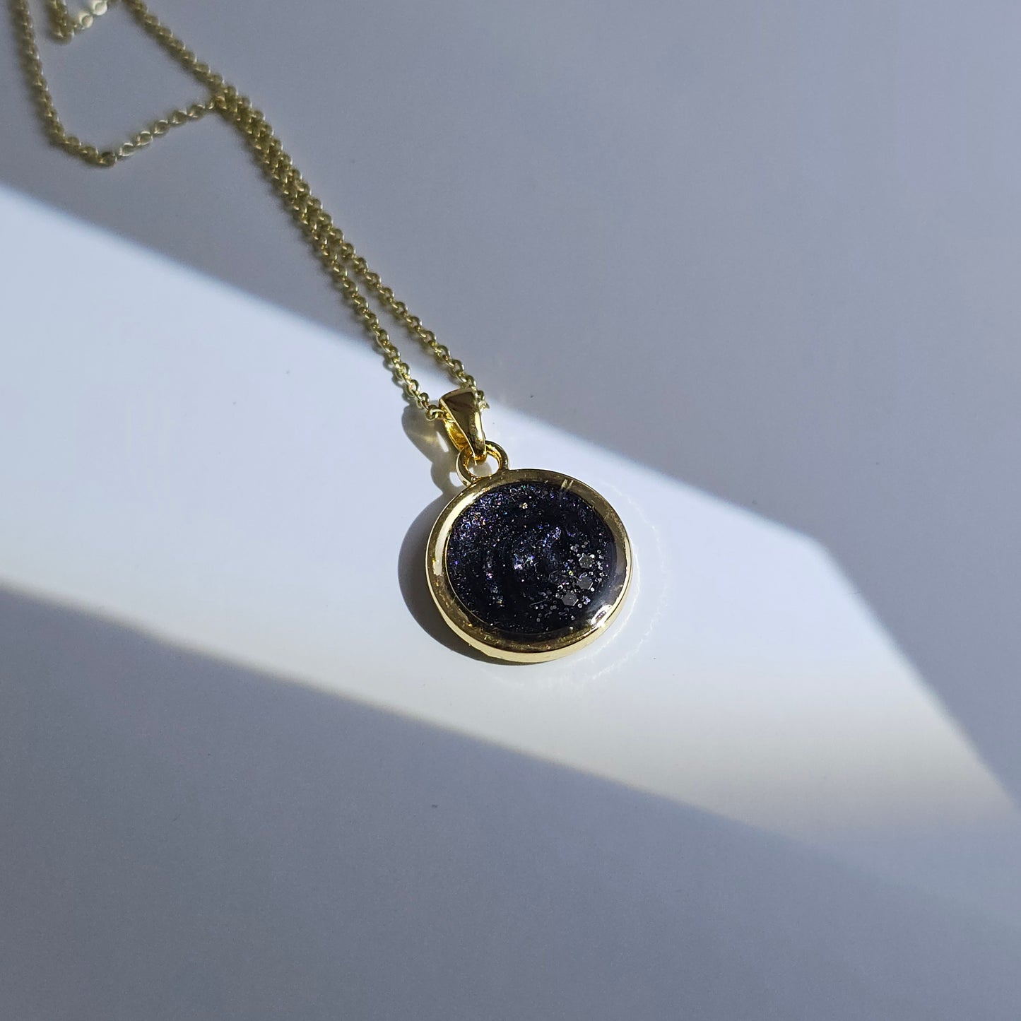 Handmade round pendant with black and grey swirls and silver flakes, 14k gold plated chain, gift for her