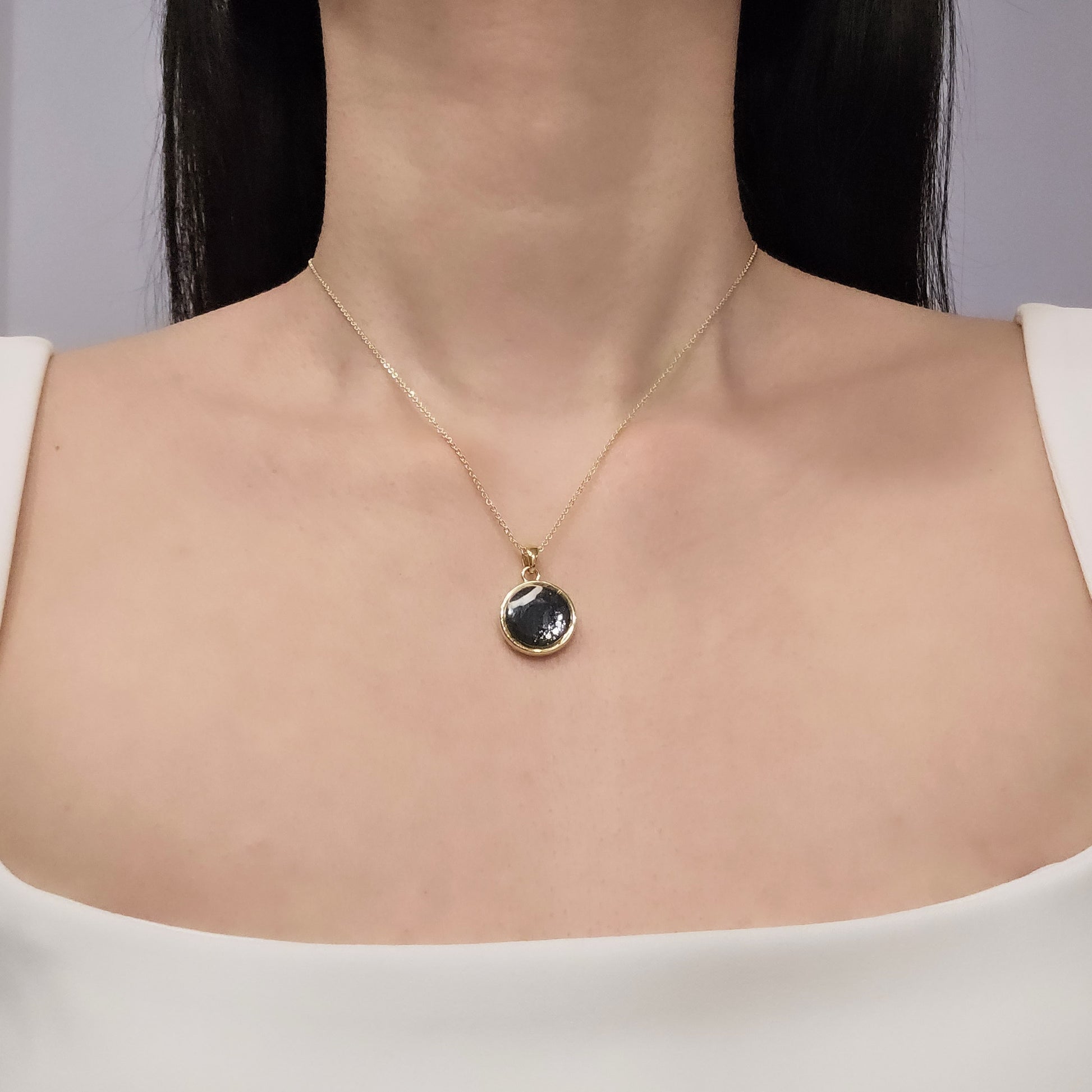Handmade round pendant with black and grey swirls and silver flakes, 14k gold plated chain, gift for her